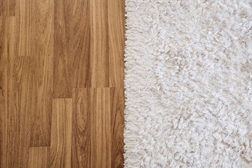 side-by-side image showing hardwood flooring vs. carpeting